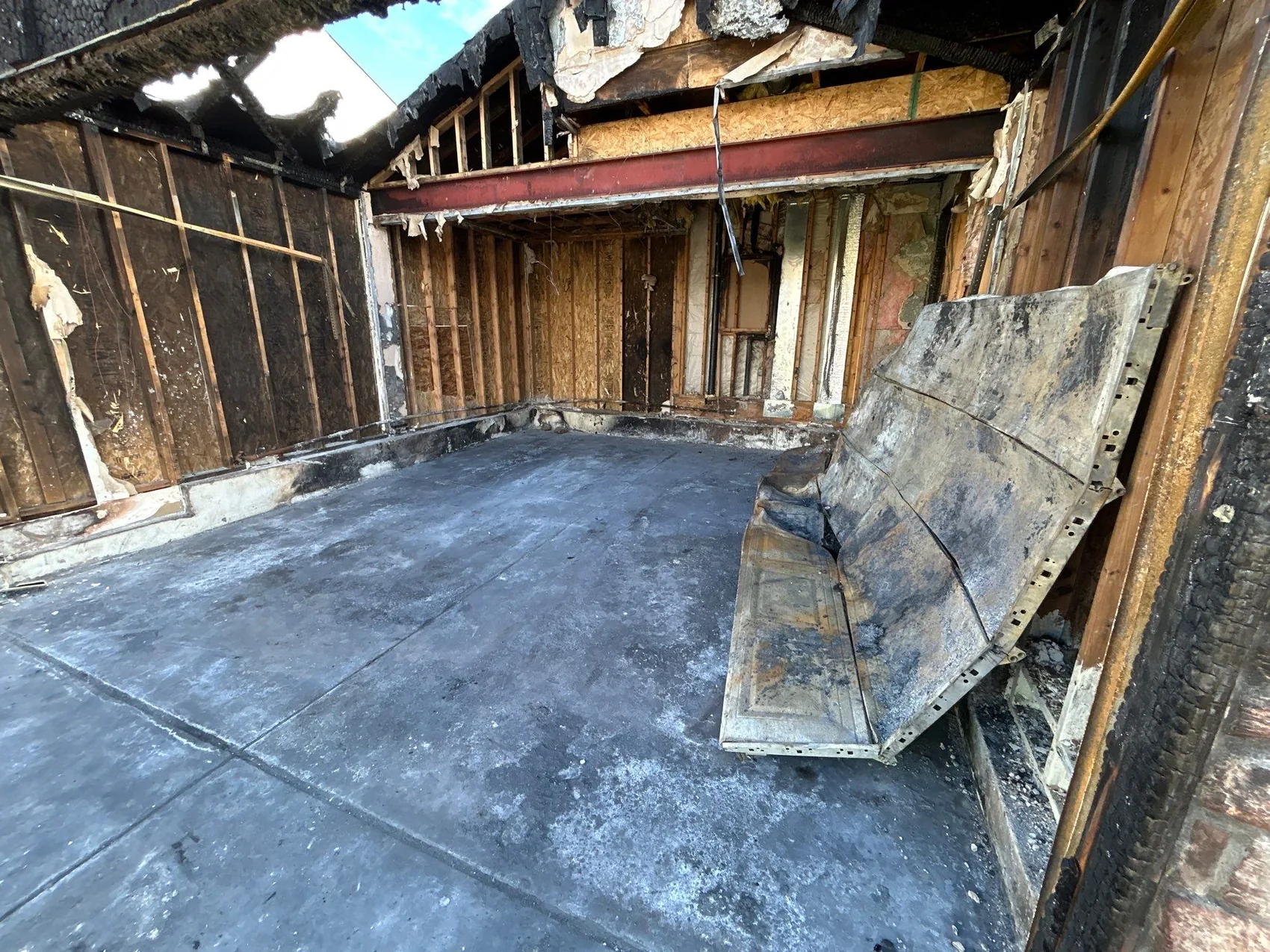 Removing charred and unsalvageable materials during fire restoration