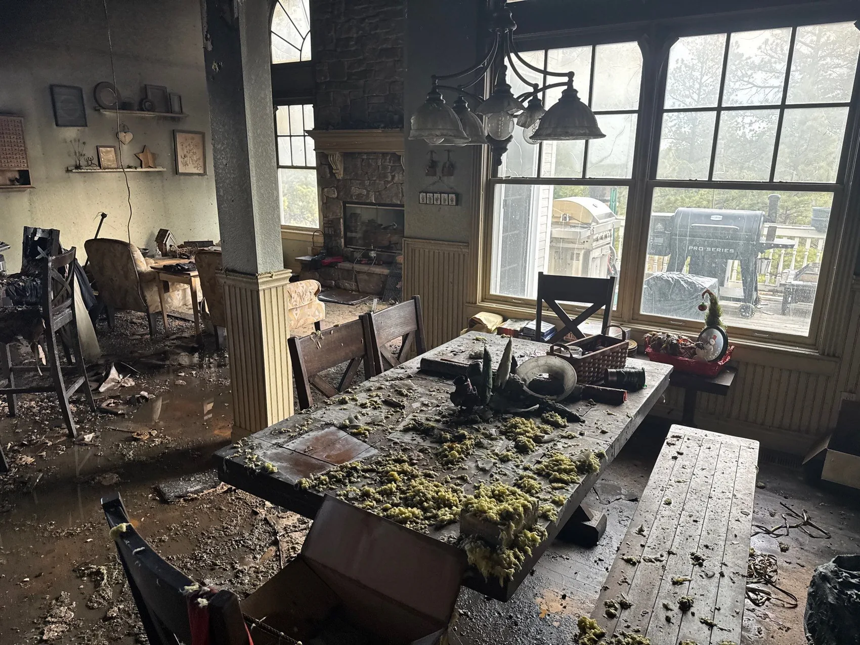 Soot and smoke damage spread across an interior after a fire
