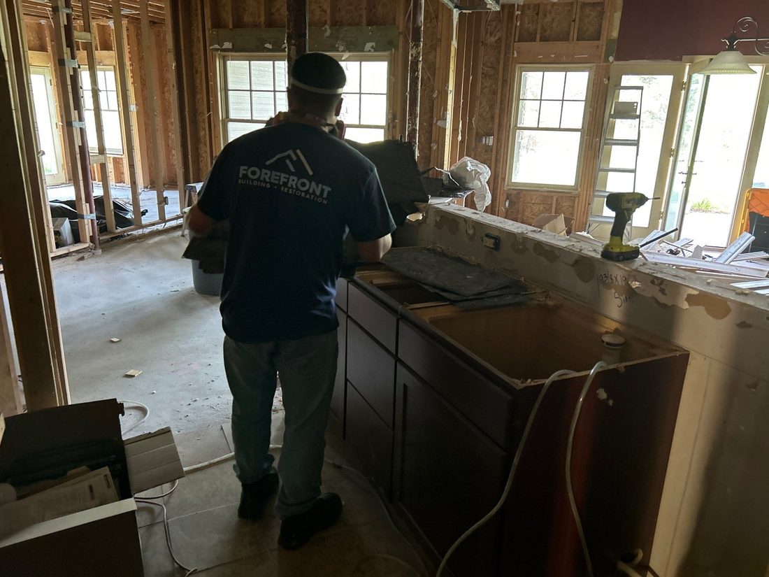 Forefront technician working in a fire-damaged Colorado kitchen