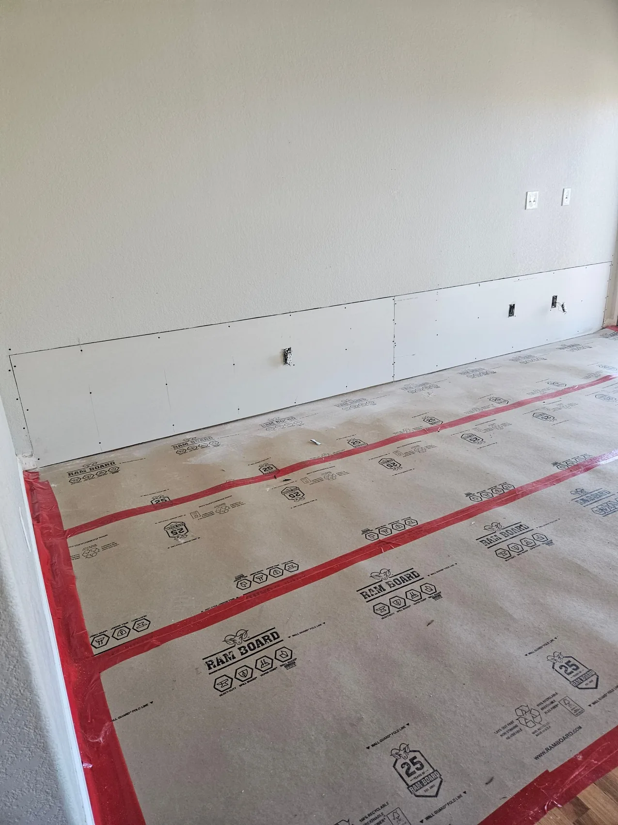 Room with new drywall installed after mold remediation and reconstruction