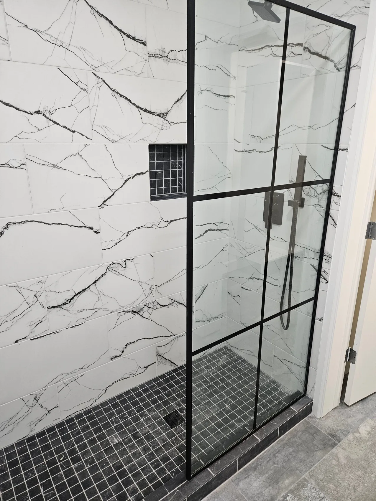 Finished, fully restored tiled shower after reconstruction