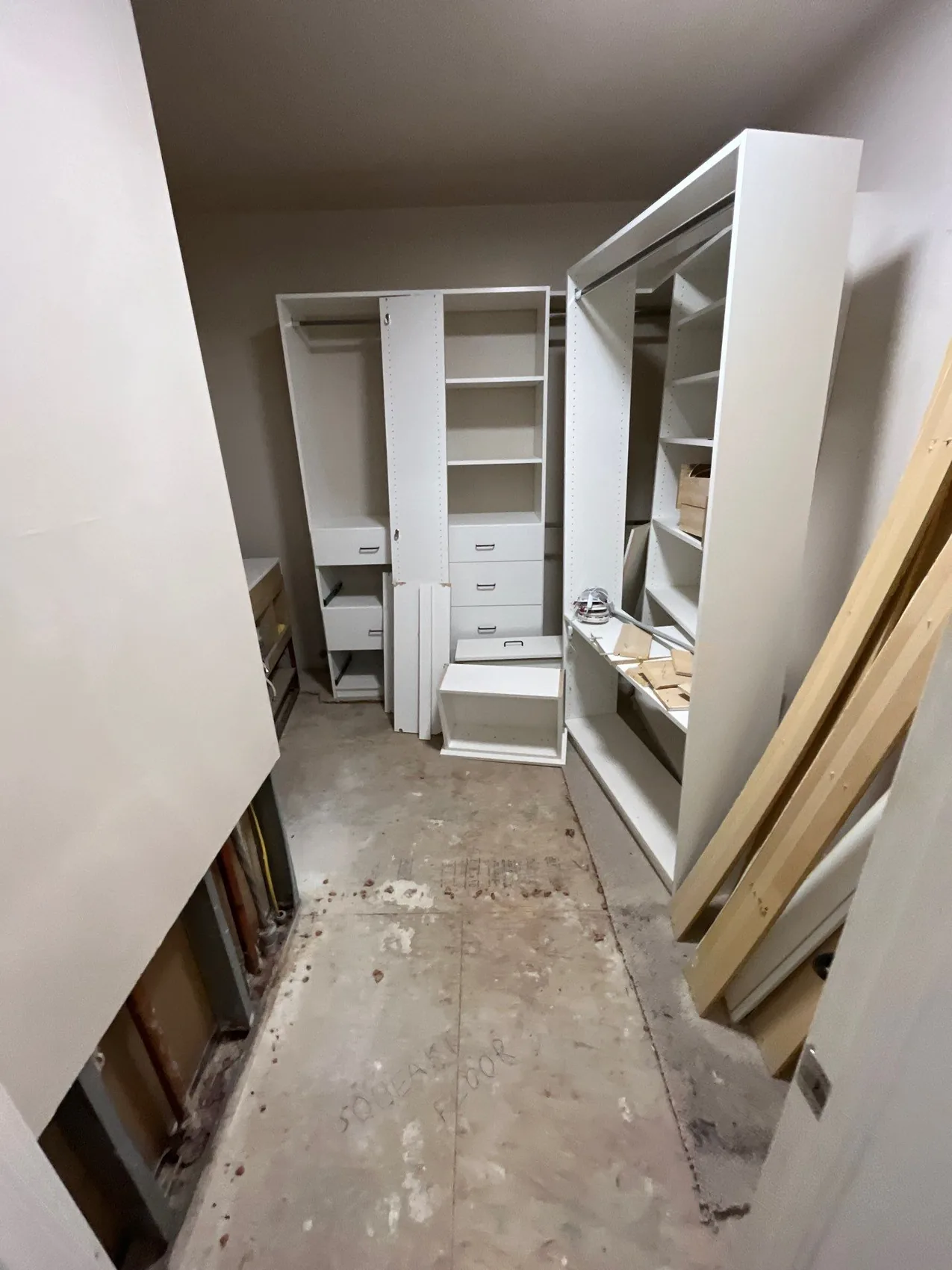 A stripped interior as the reconstruction and insurance scope is settled