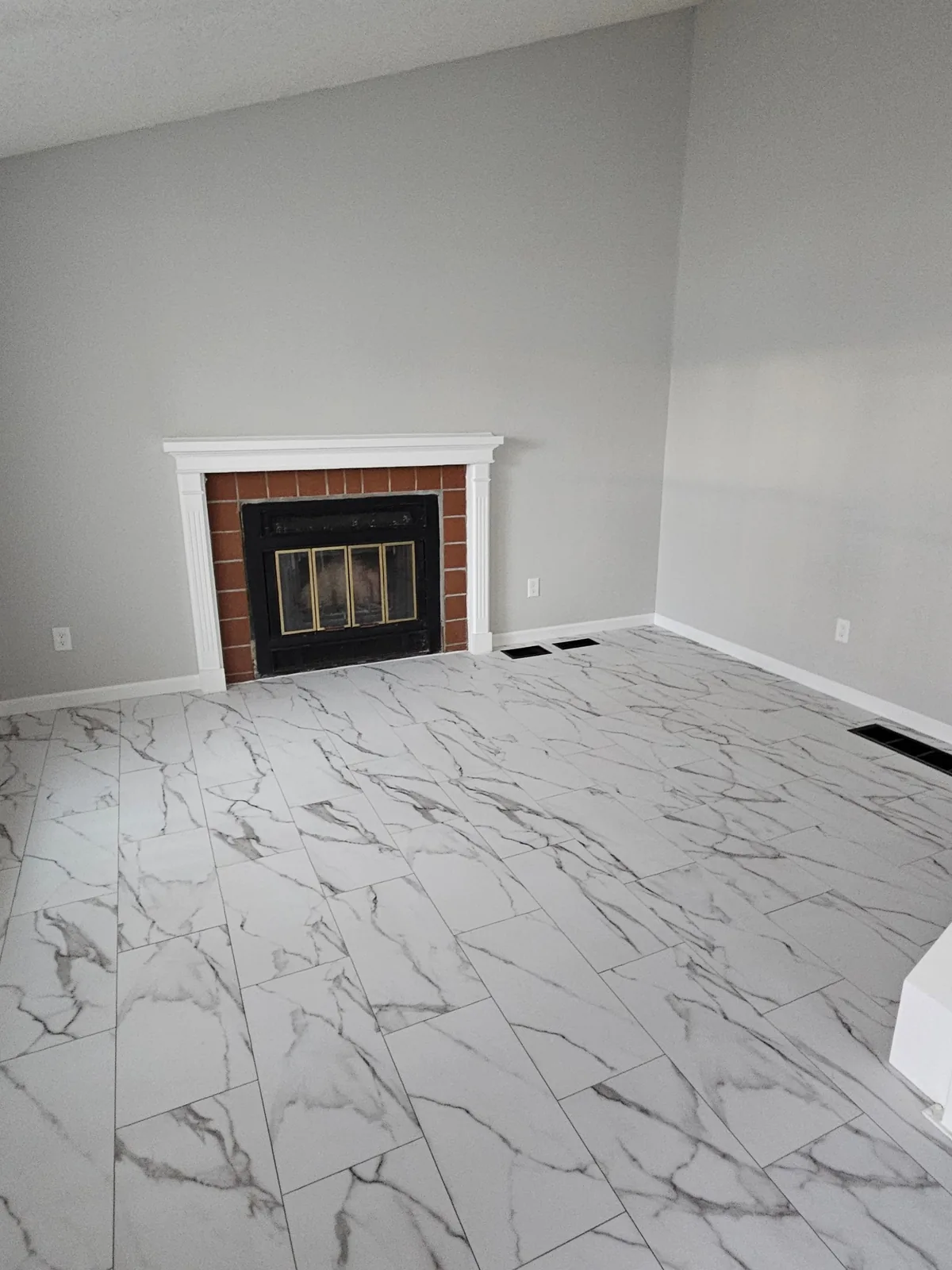 Fully restored living room after water damage reconstruction in Colorado