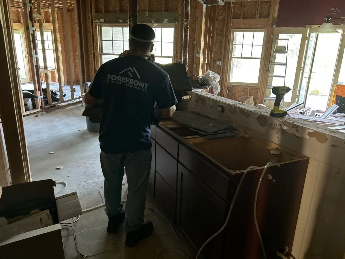 Forefront technician working in a fire-damaged Colorado kitchen
