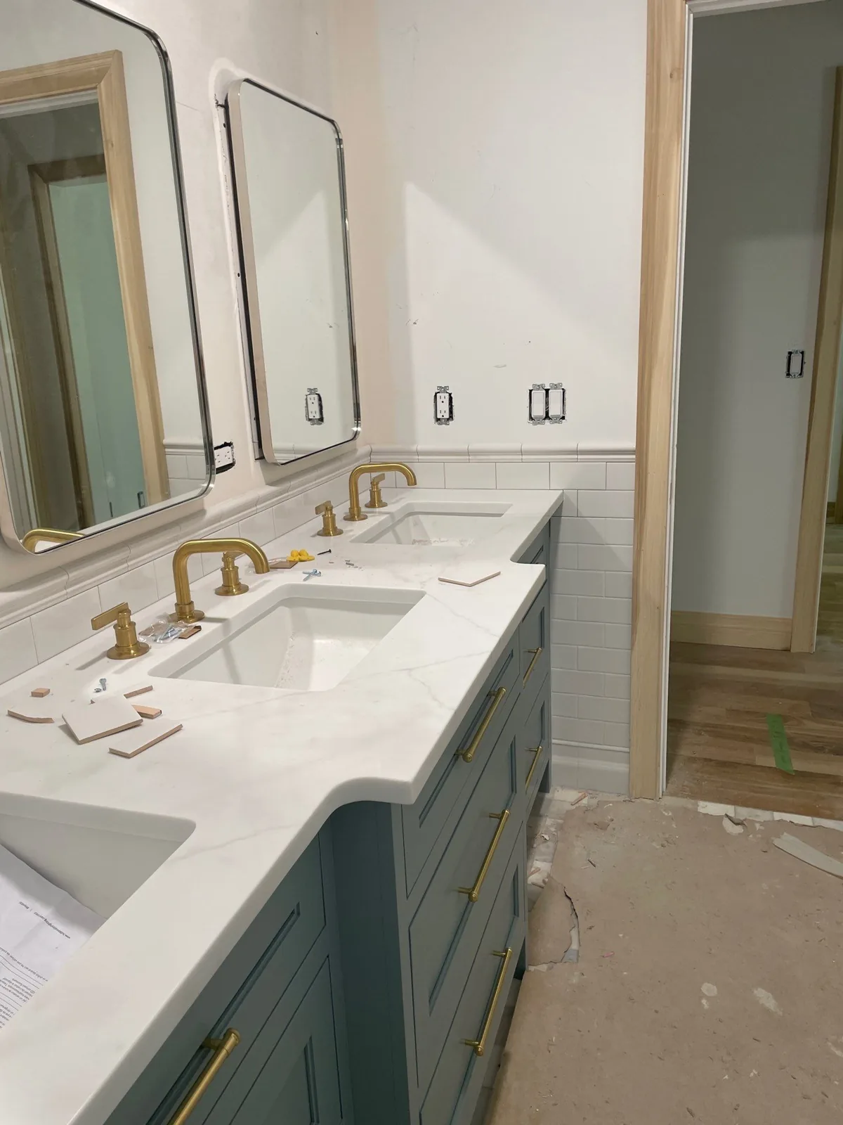 New bathroom vanity and quartz counter during a Forefront reconstruction rebuild