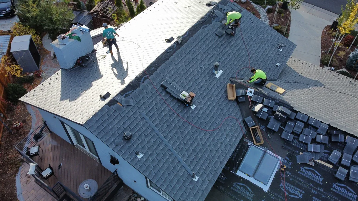 Forefront crew replacing a storm-damaged roof on a Colorado home